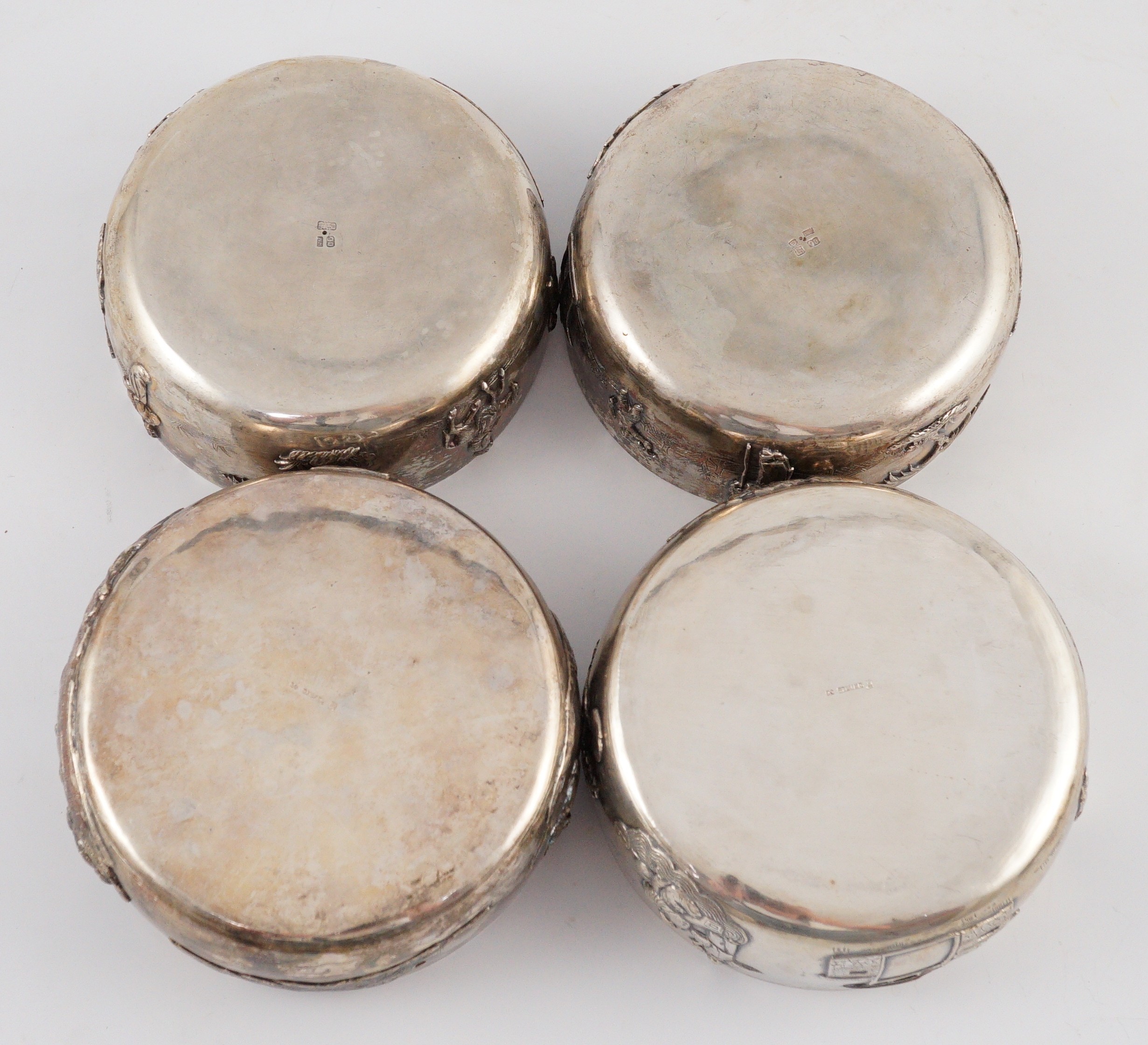 A set of four Chinese Export silver finger bowls, by Wang Hing, Hong Kong and one other set of four Chinese Export silver finger bowls